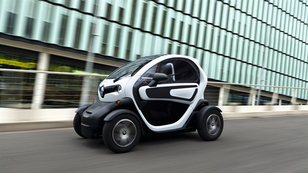 A man driving a Renault Twizy
