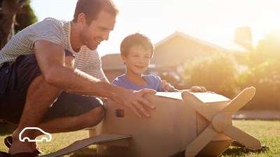 Renault Service - a man with his son building a model